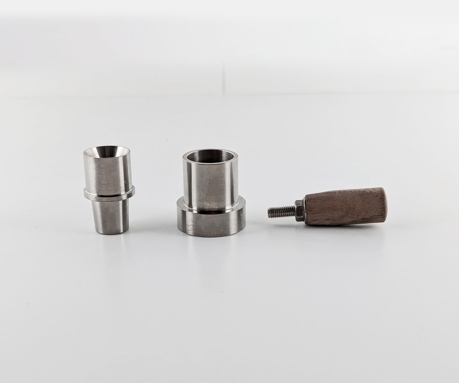 Showing the titanium bowl disassembled and parts next to each other.