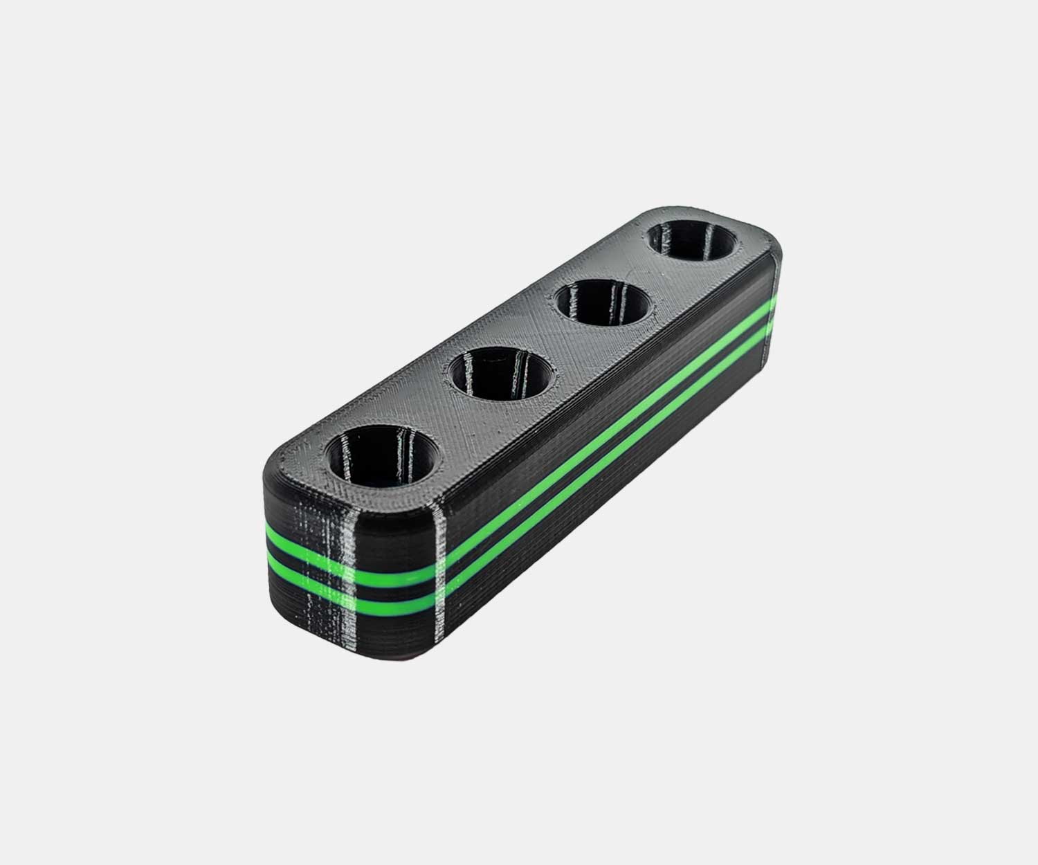 Side view of the Heavy Hitter bowl holder in green.