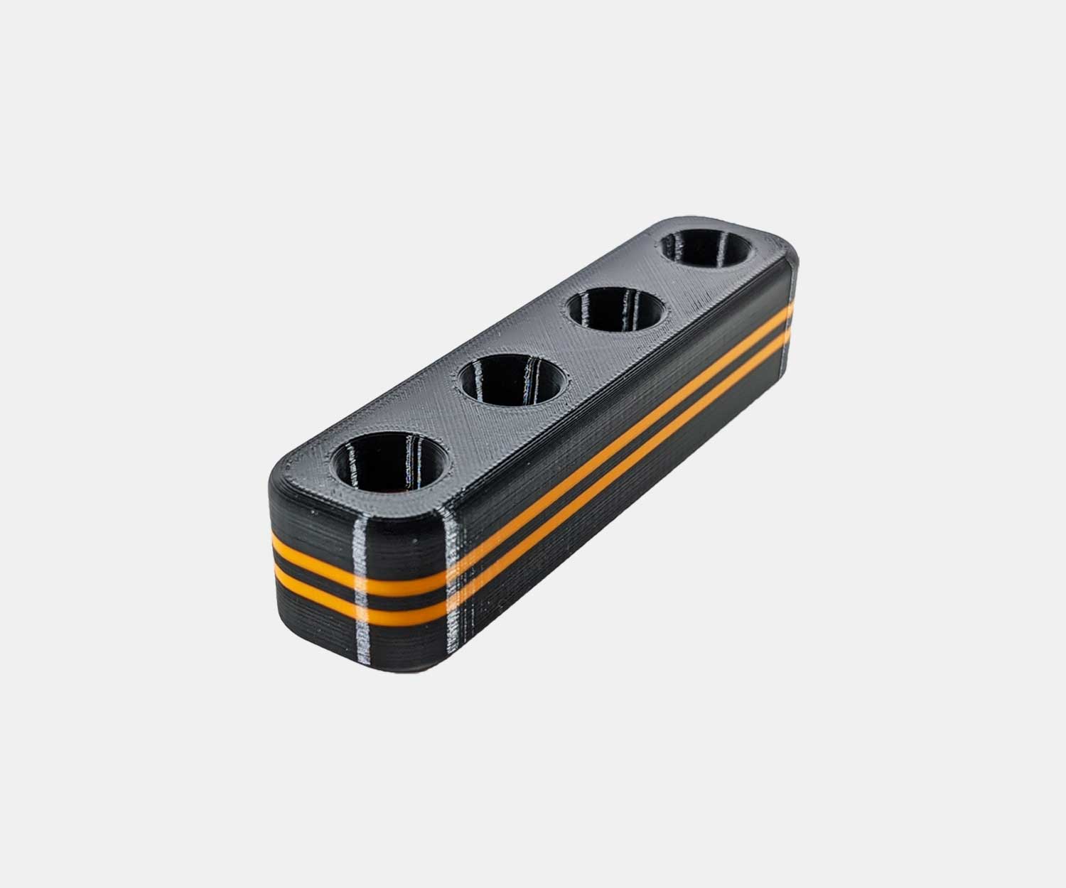 Side view of the Heavy Hitter bowl holder in orange.
