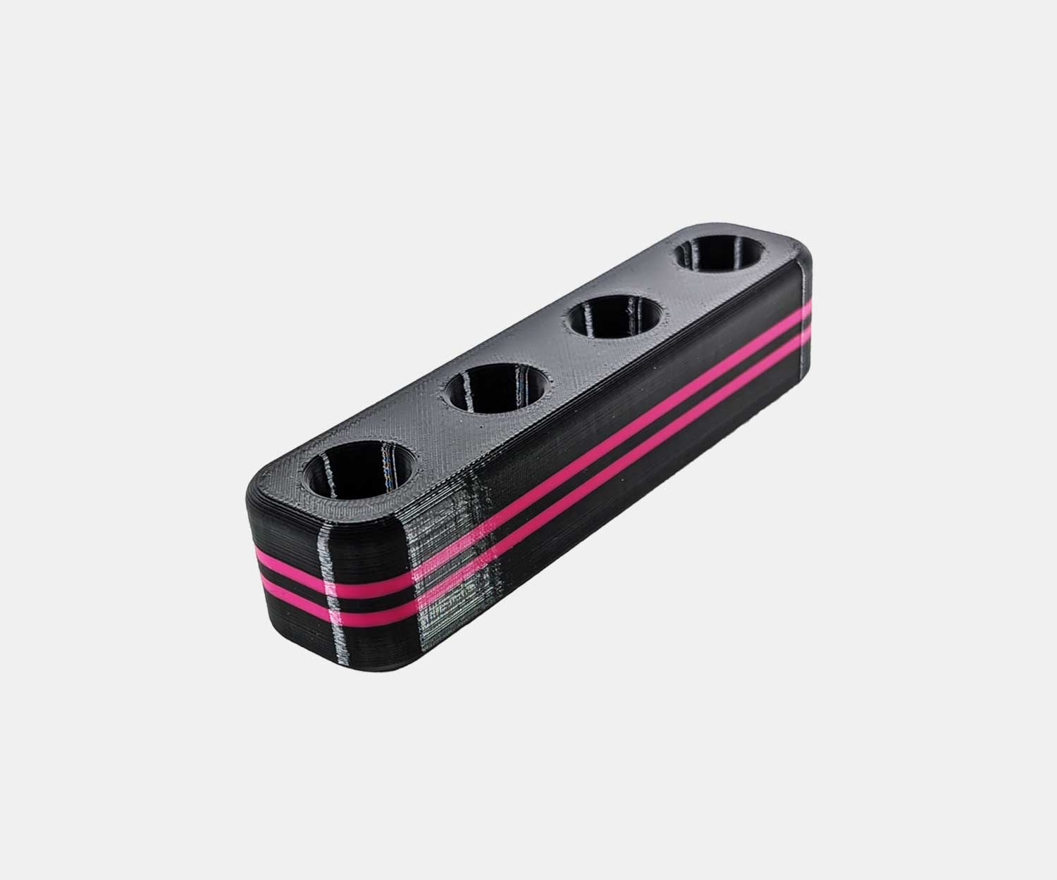 Side view of the Heavy Hitter bowl holder in pink.
