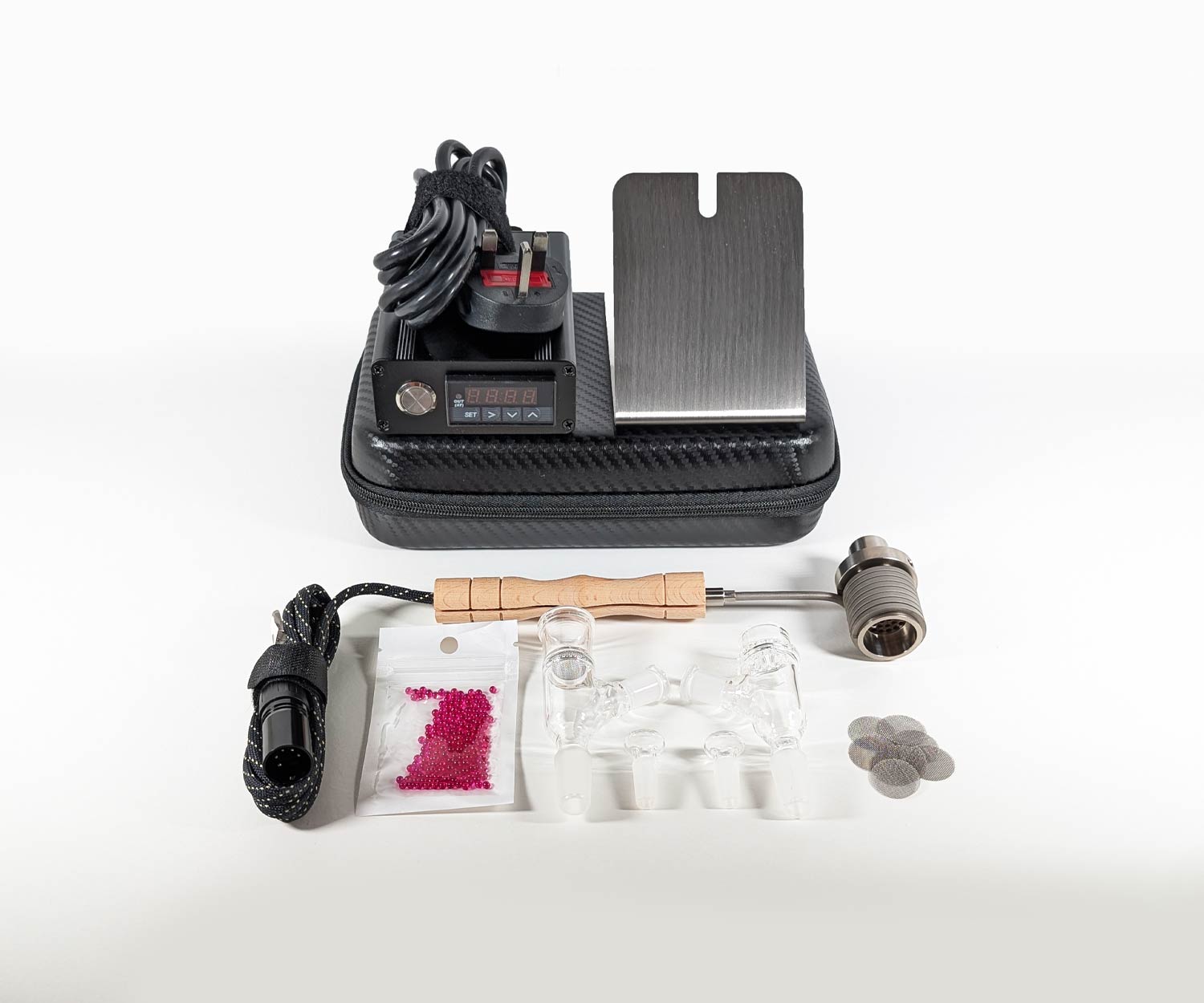 Displaying the contents of the Terp Ripper duo ball vape kit.