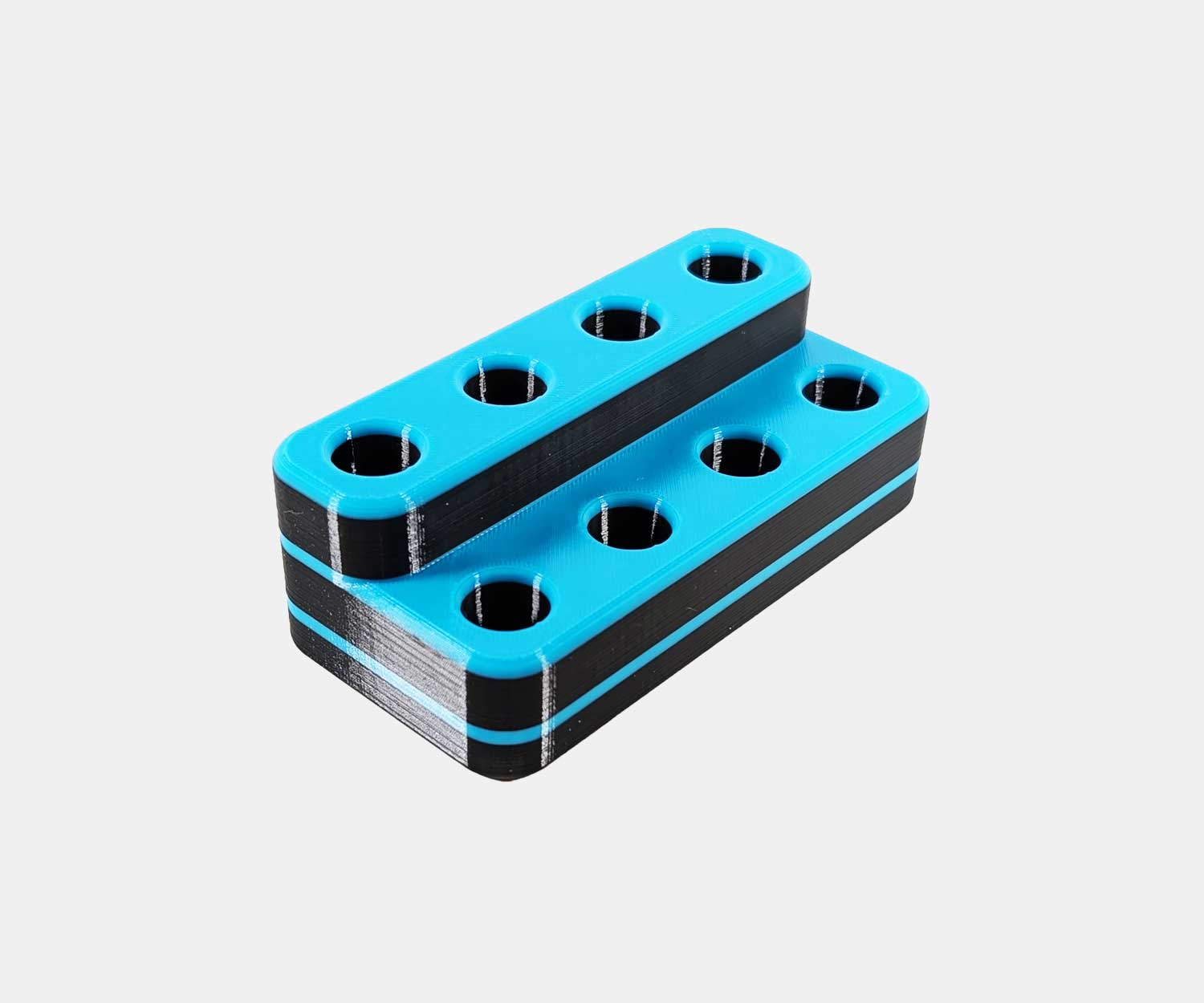 Side view of the Heavy Hitter bowl holder in blue.