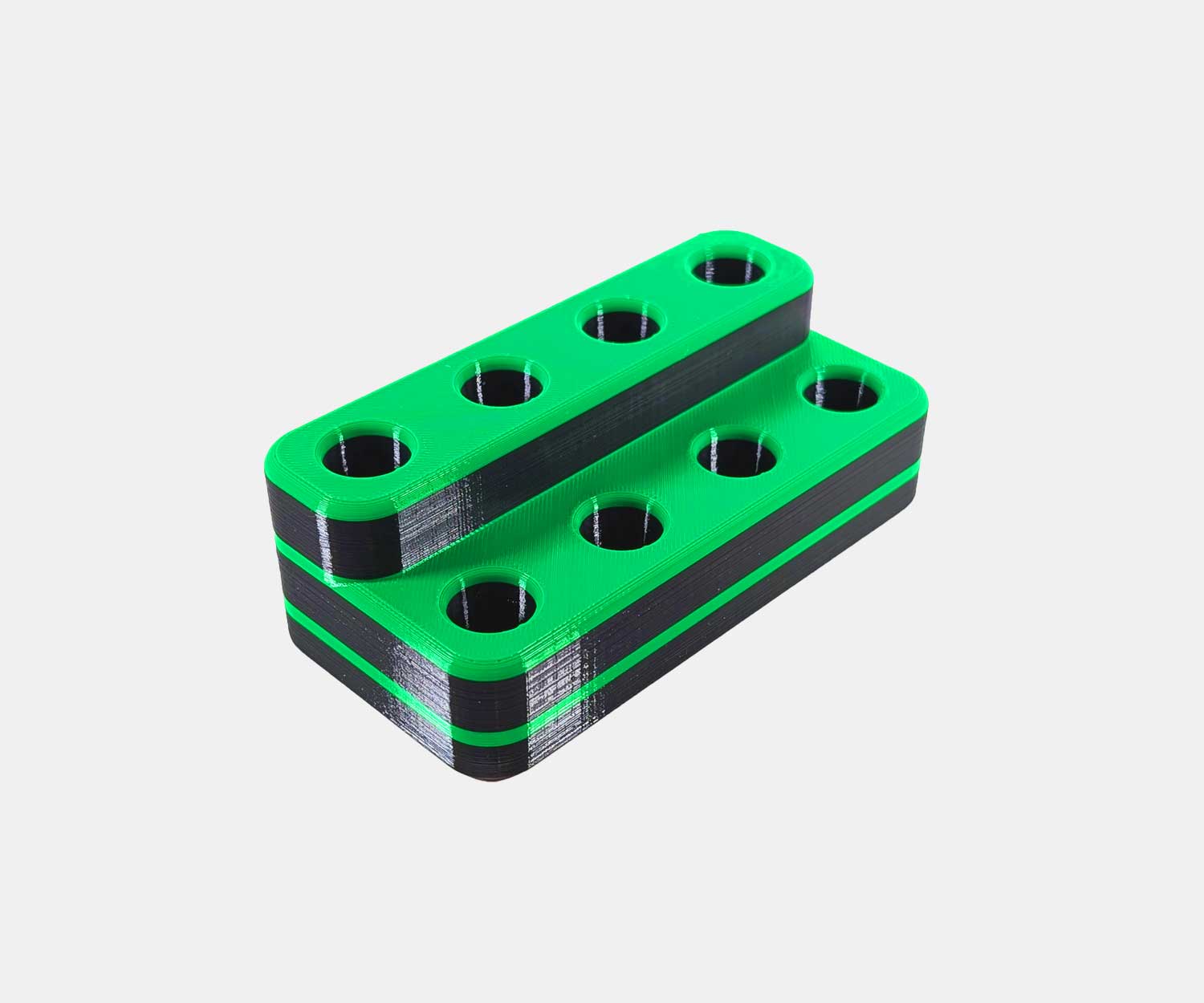 Side view of the Heavy Hitter bowl holder in green